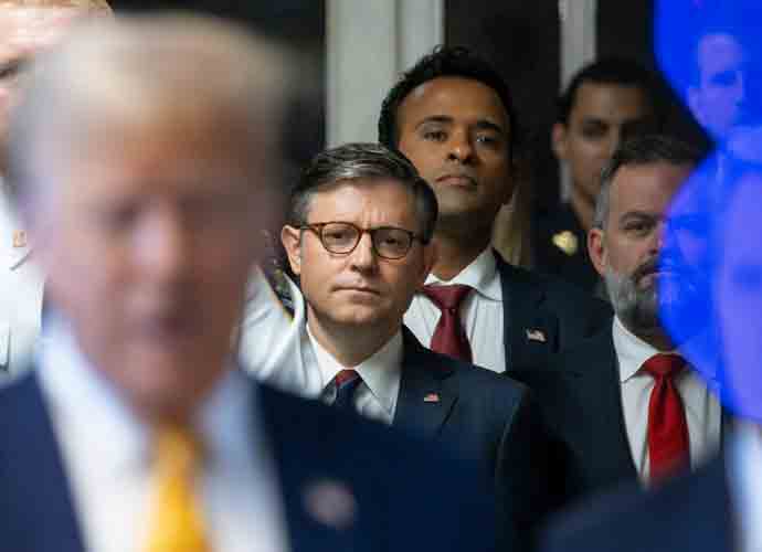 NEW YORK, NEW YORK - MAY 14: US Speaker of the House Mike Johnson (C) and businessman Vivek Ramaswamy (3-L) listen as former U.S. President Donald Trump (C) sits next to his lawyers Todd Blanche (L) and Emil Bove as he arrives for his trial for allegedly covering up hush money payments linked to an extramarital affair with Stormy Daniels, at Manhattan Criminal Court on May 14, 2024 in New York City. Former U.S. President Donald Trump faces 34 felony counts of falsifying business records in the first of his criminal cases to go to trial. (Photo by Justin Lane - Pool/Getty Images)