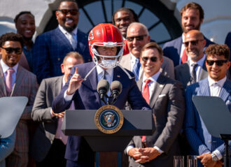 WASHINGTON, DC - MAY 31: U.S. President Joe Biden wears a football helmet while hosting the NFL Super Bowl champions Kansas City Chiefs on the South Lawn of the White House on May 31, 2024 in Washington, DC. The Chiefs defeated the San Francisco 49ers 25-22 in overtime to win the 2024 Super Bowl. (Photo by Chip Somodevilla/Getty Images)