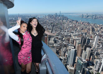 NEW YORK, NEW YORK - JULY 02: (L-R) Kylie Cantrall and Malia Baker pose as the cast of "The Descendants" visits the Empire State Building on July 02, 2024 in New York City. (Photo by Dimitrios Kambouris/Getty Images for Empire State Realty Trust)