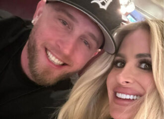 Tom Hanks’ Son, Chet, & Troubled Reality Star Kim Zolciak Fuel Romance Rumors Attending Jelly Roll Concert Together