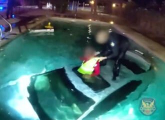 VIDEO: Dramatic Moment Police Rescue Man Trapped Inside Car Submerged In Pool