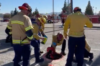 VIDEO: Firefighters Rescue Woman Who Fell 15 Feet Into A Manhole & Trapped Overnight Underground