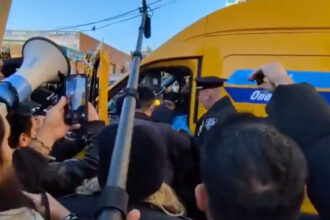 VIDEO Amazon Driver Detained By Cops At Strike In New York