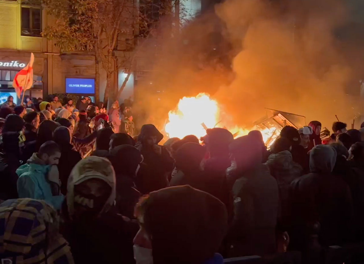 VIDEO: Fiery Barricades Erected In Tbilisi As Thousands Protest Halt To EU Talks