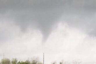 VIDEO: Funnel Cloud Looms Amid Tornado Warning in Katy, Texas