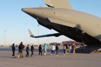 VIDEO: Footage Shows First Deportation Flight Under Trump Administration