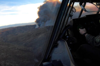 VIDEO: Aerial View As California Air National Guard Drops Retardant On Hughes Fires In L.A.