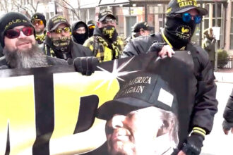 VIDEO: Right-Wing Proud Boys Group Marches In D.C. With Banner Congratulating President Trump