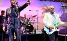LOS ANGELES, CA - JUNE 09: (L-R) Producer Frank Marshall, actor Chris Pratt and musician Jimmy Buffett perform at the after party for the premiere of Universal Pictures' "Jurassic World" at Hollywood & Highland on June 9, 2015 in Los Angeles, California. (Photo by Kevin Winter/Getty Images)
